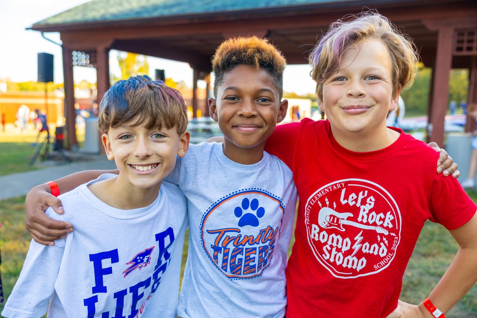 3 boys smiling